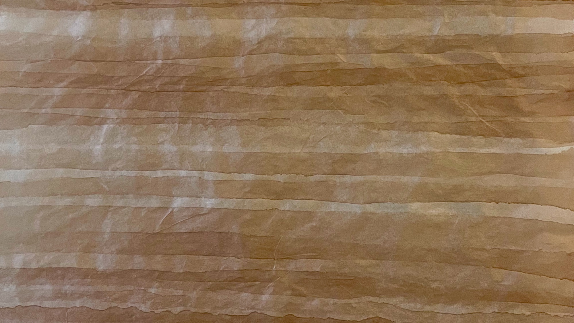 Bands of red-brown kakishibu painted on washi with visible wet edges